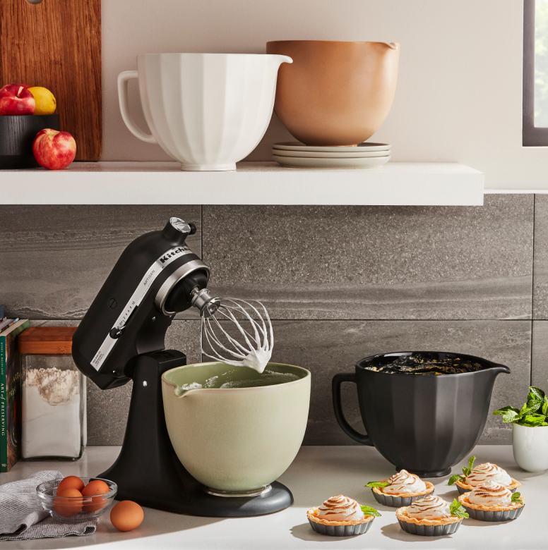 Stand mixer with bowls in multiple colors