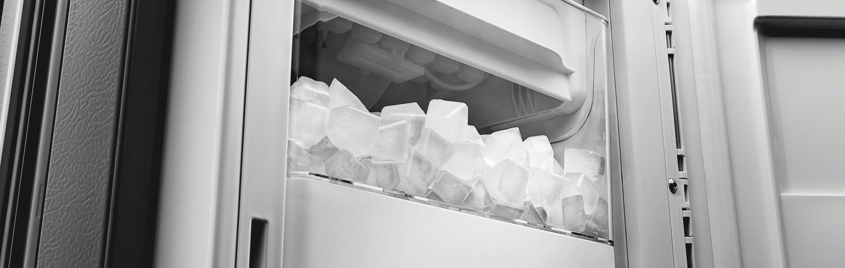 Close-up of a full, in-door ice maker