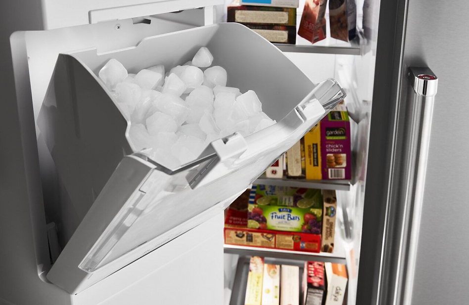 Side by side refrigerator open showing in-door ice storage