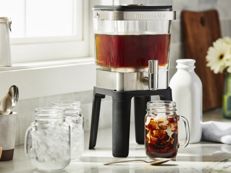 KitchenAid® cold brew coffee maker above mason jar glass filled with coffee