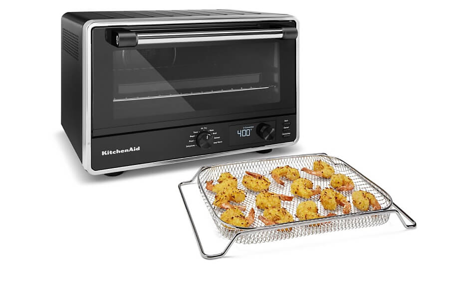  KitchenAid® countertop oven with fried shrimp in air fryer basket