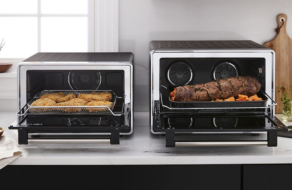 side-to-side countertop ovens loaded with different proteins