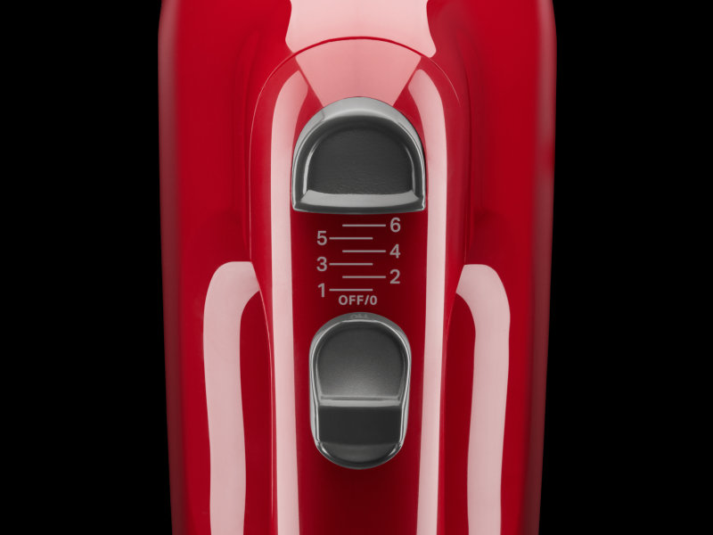 Close up of speed settings on red KitchenAid® hand mixer 