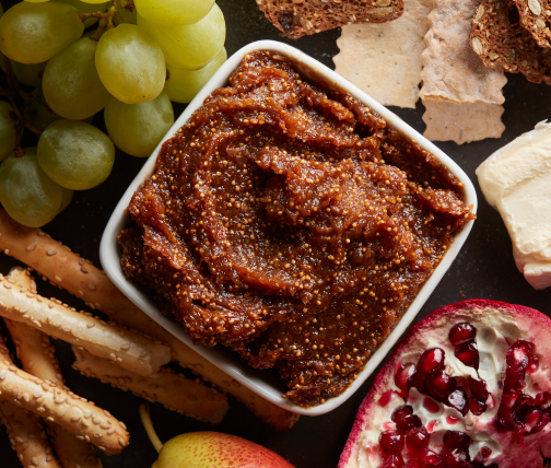 Pureed fig jam surrounded by food for dipping