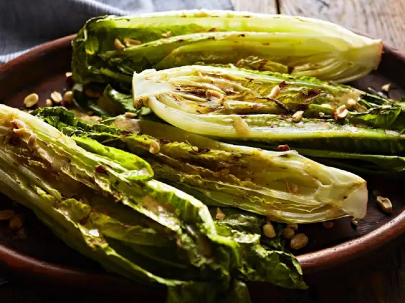 Grilled romaine on platter