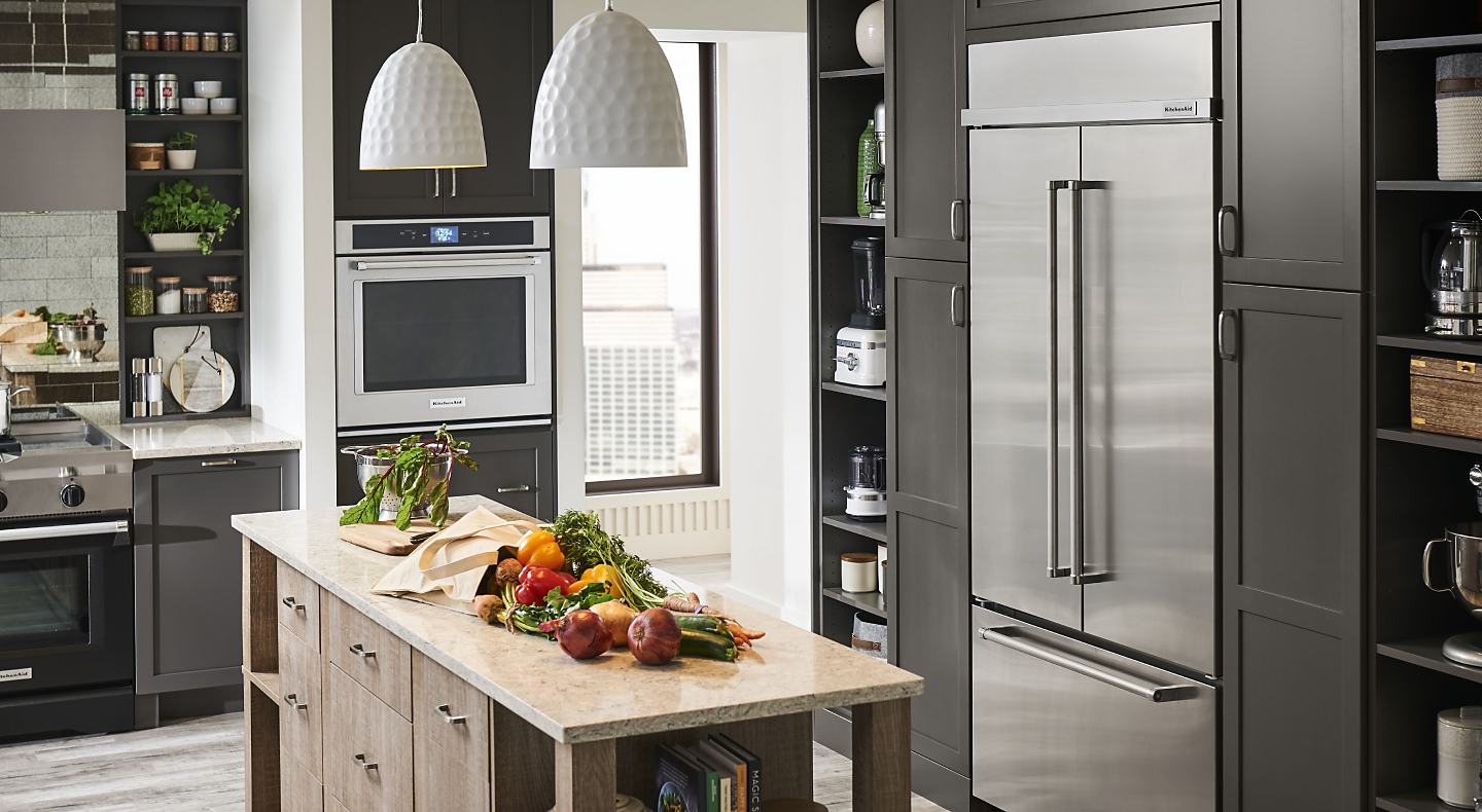 KitchenAid® French door refrigerator built into black cabinetry