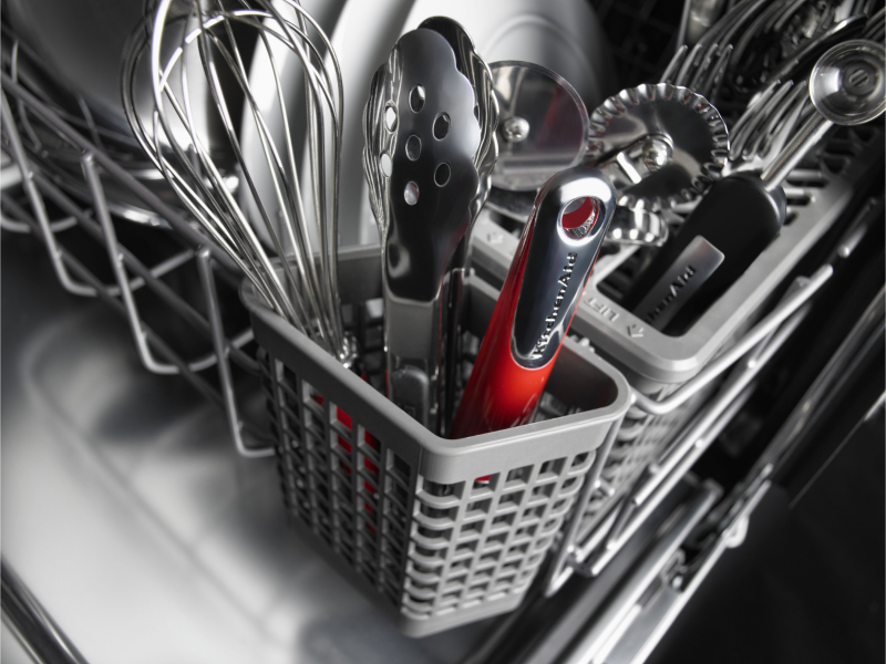 The silverware basket of a KitchenAid® dishwasher.