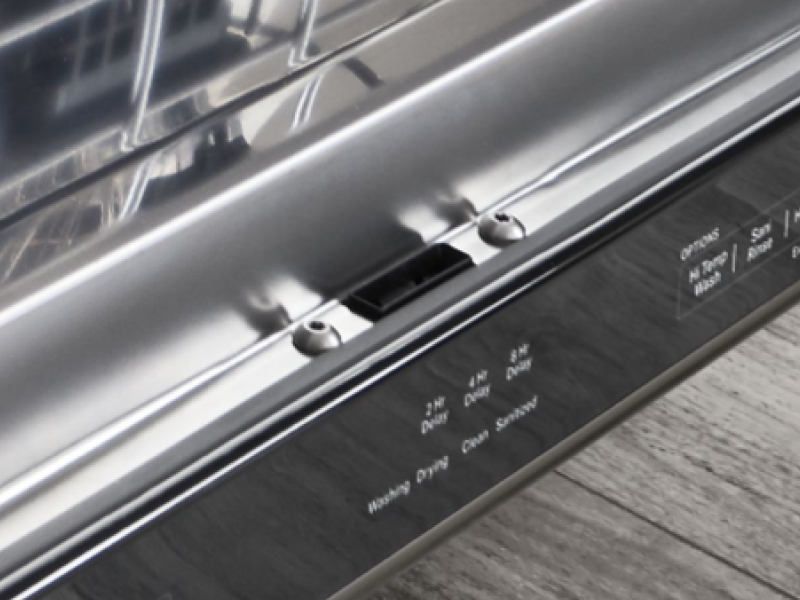 The door latch of a KitchenAid® dishwasher.