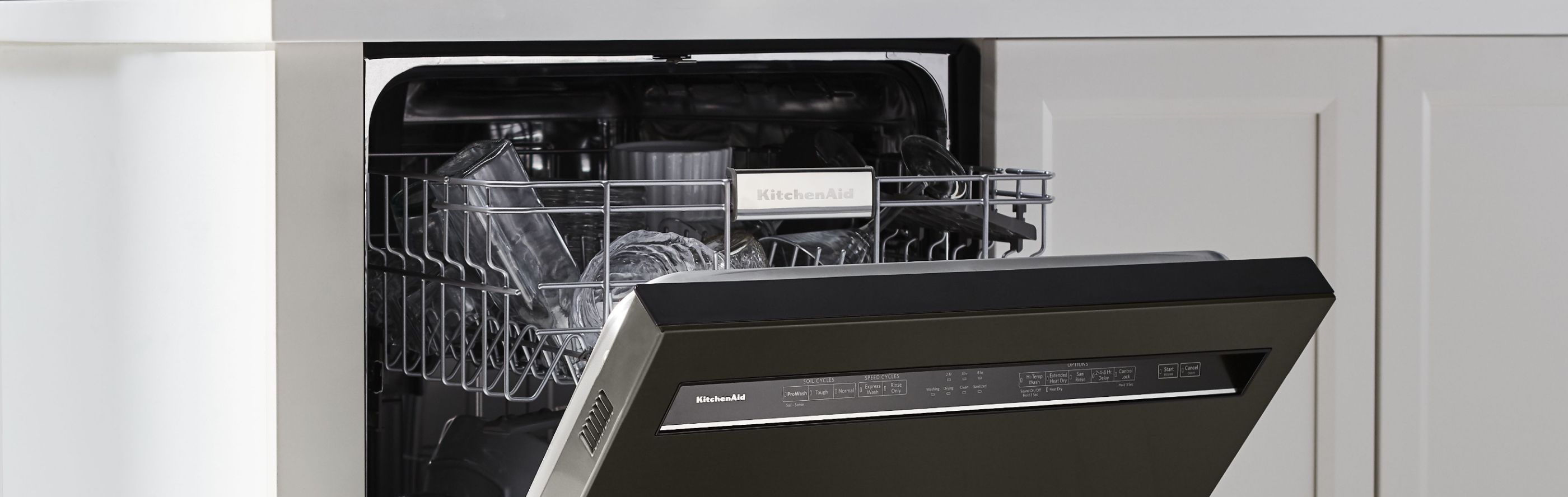 A closeup of the inside of a KitchenAid® dishwasher.