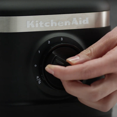 Hand turning dial on KitchenAid® blender