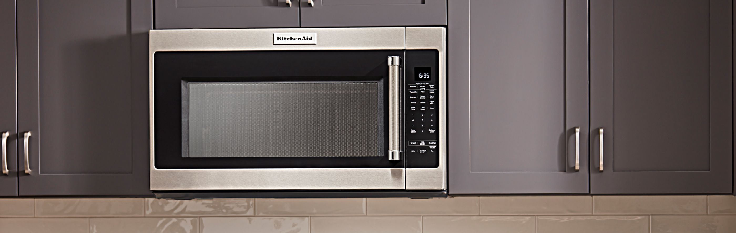 Over-the-range microwave in grey cabinets