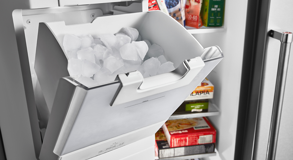 Ice maker with ice in a freezer 