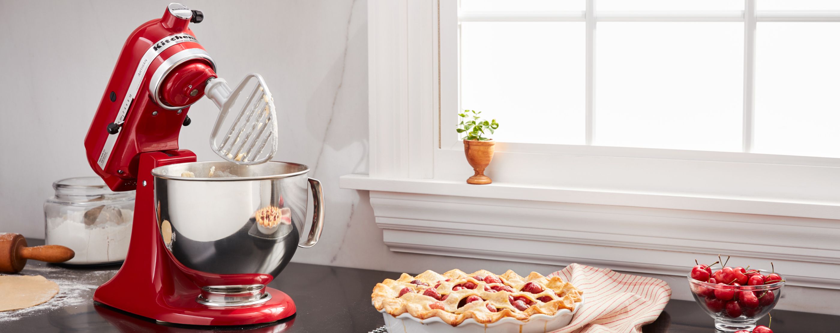Red KitchenAid® Stand Mixer with pastry blender attachment 