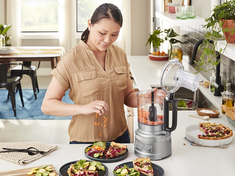 Person using KitchenAid® food processor