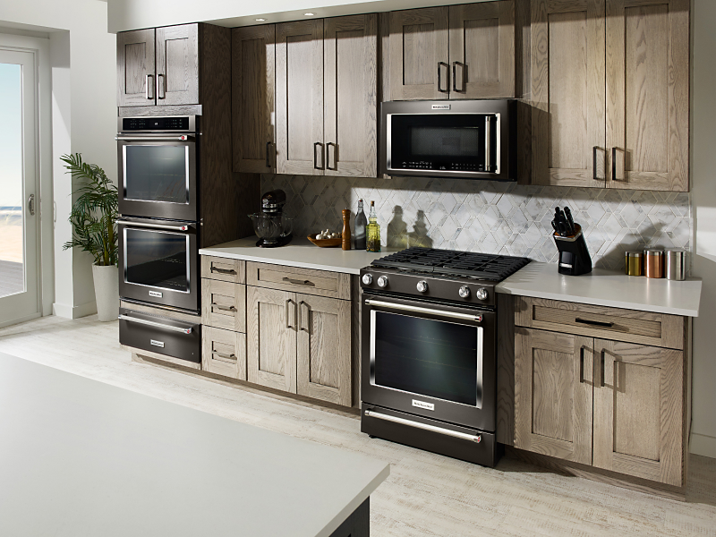 Black KitchenAid® slide-in range, microwave and double wall oven