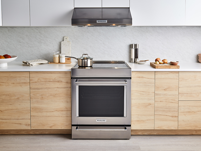 A stainless steel KitchenAid® slide-in range in a modern kitchen