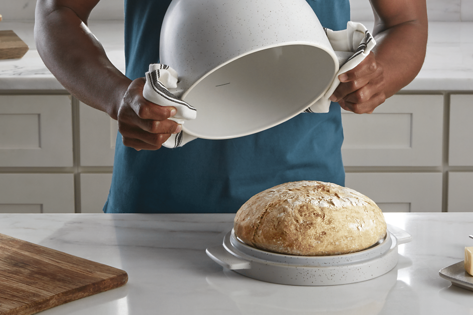 Man using the KitchenAid® Bread Bowl for fresh-baked bread Man using the KitchenAid® Bread Bowl for fresh-baked bread