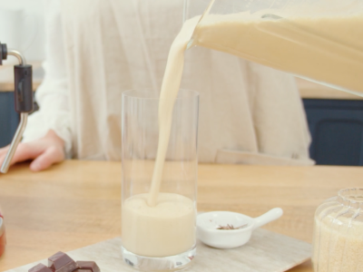 Frappe pouring into a tall glass