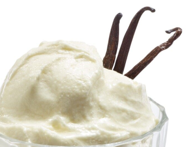 Vanilla ice cream with three vanilla bean pods