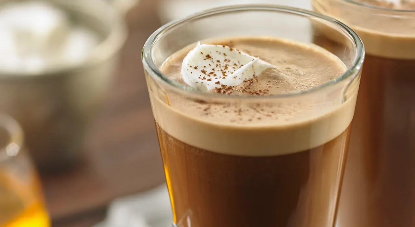 Irish coffee topped with a dollop of whipped cream
