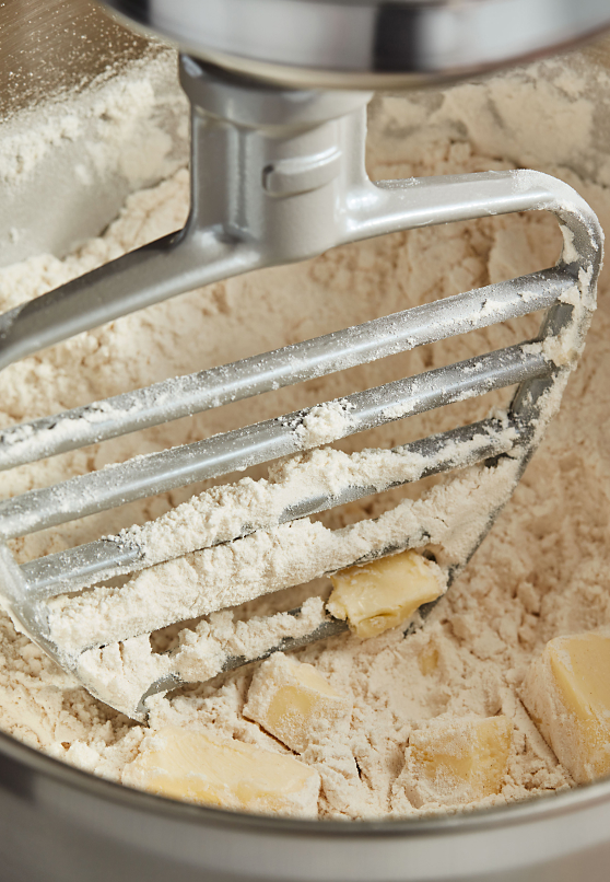KitchenAid® Pastry Beater cutting butter into flour