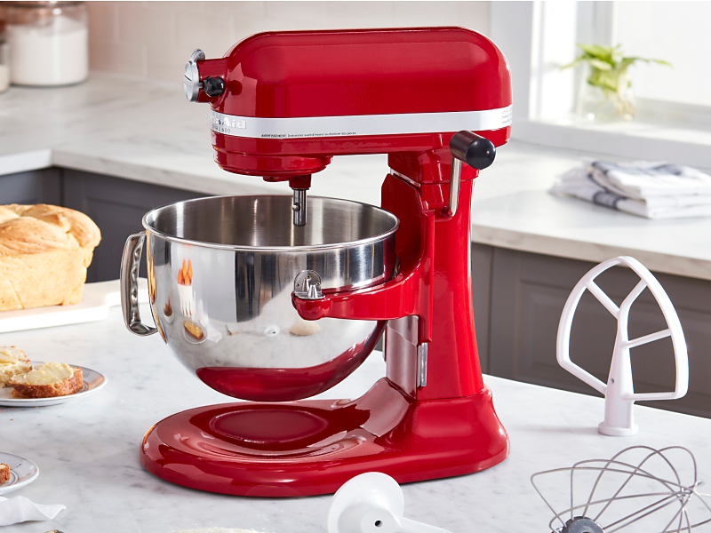 Stand mixer on the counter with bread and beater accessory