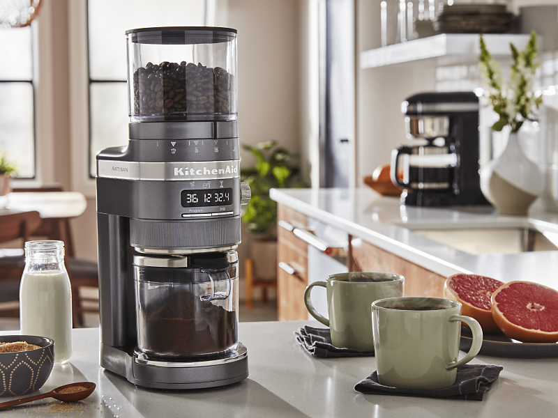 KitchenAid® Burr Grinder with 2 green coffee mugs