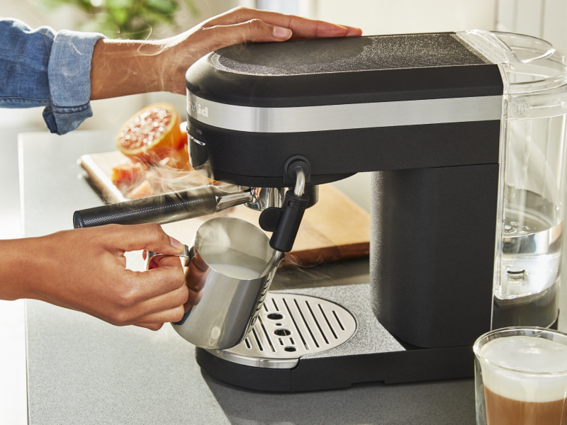 Milk being steamed with steam wand on a KitchenAid® Semi-Automatic Espresso Machine