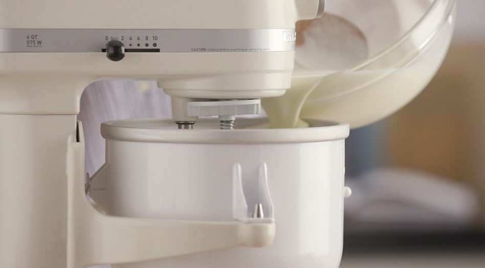 Pouring ice cream base into the Ice Cream Maker attachment on a stand mixer
