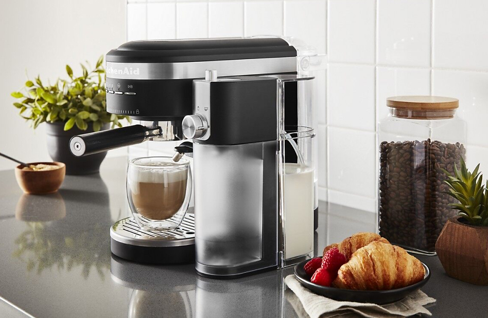 Test Cappuccino under espresso maker with croissants