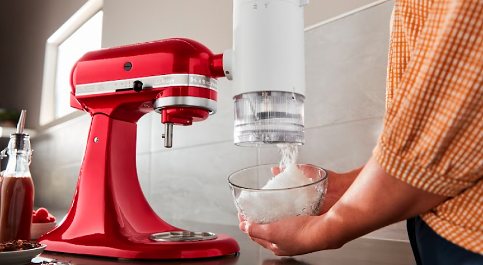 A Red KitchenAid® Stand Mixer with Shave Ice Attachment.