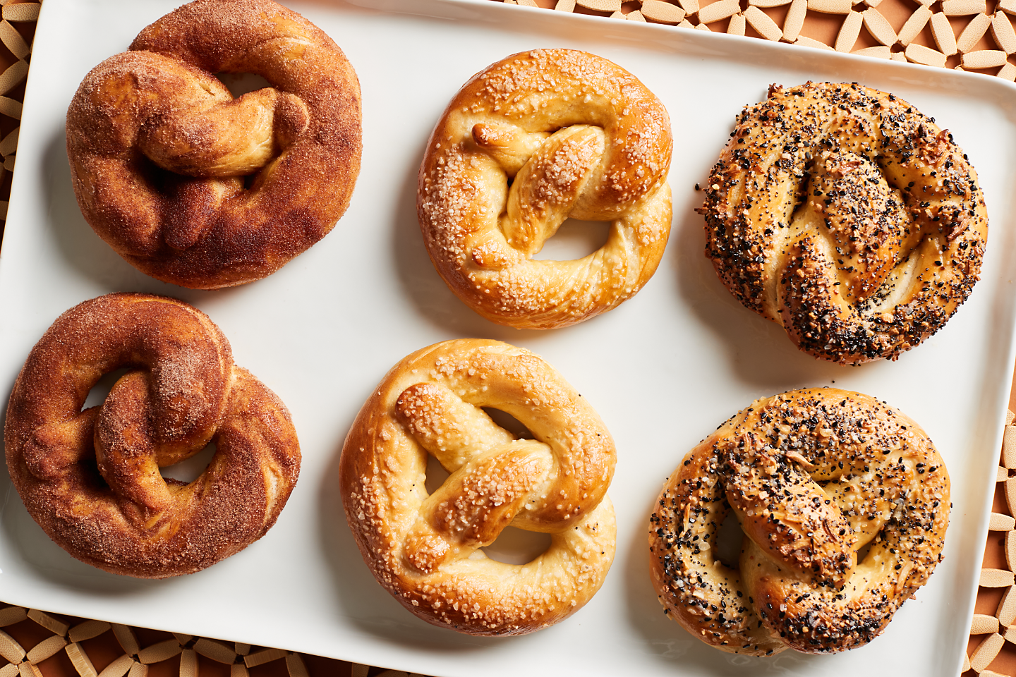 Close-up of homemade soft pretzels in a variety of flavors