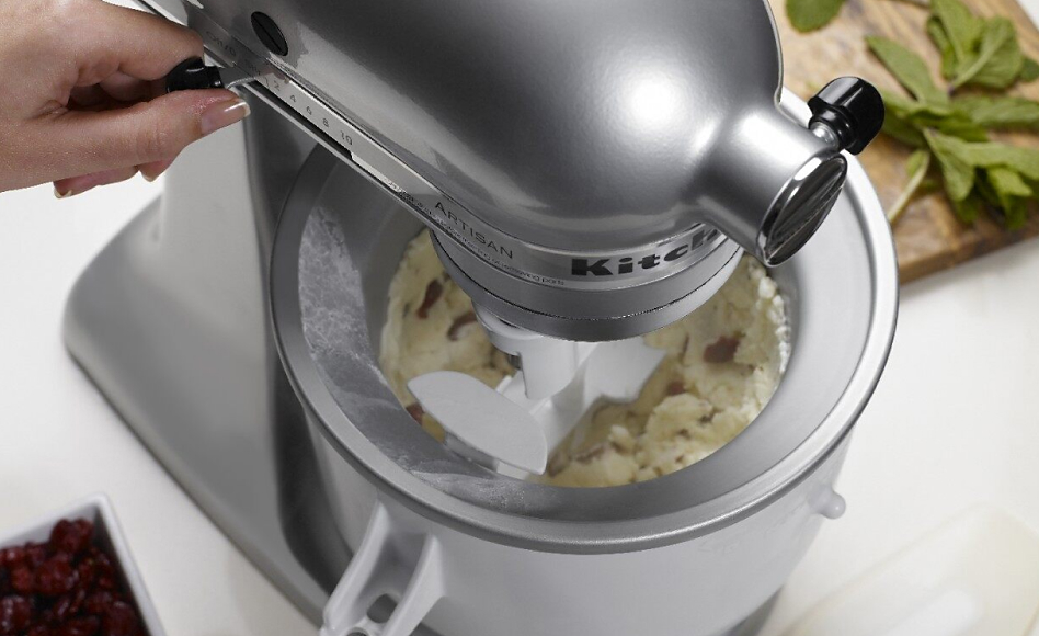 Churning ice cream inside a KitchenAid® Ice Cream Maker attachment bowl