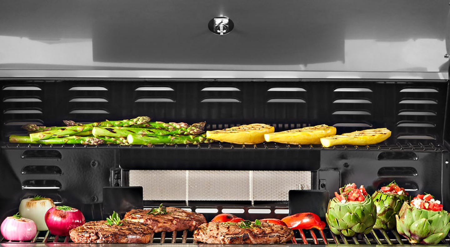 Grill with grilled meats and vegetables