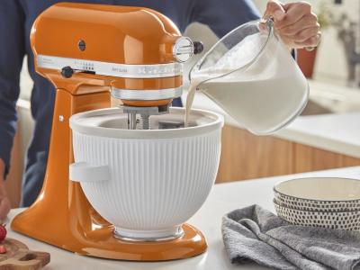 Pouring ice cream mixture into a Kitchenaid® stand mixer with ice bowl attachment