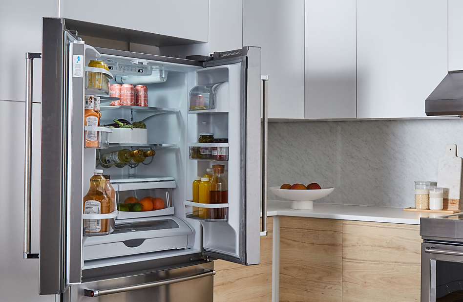 An organized KitchenAid® French Door refrigerator with both doors opened
