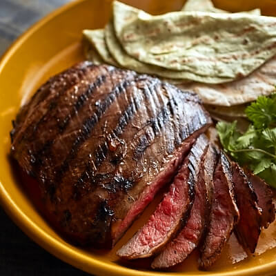 Cooked and sliced steak