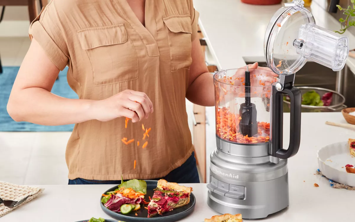 https://kitchenaid-h.assetsadobe.com/is/image/content/dam/business-unit/kitchenaid/en-us/marketing-content/site-assets/page-content/pinch-of-help/how-to-shred-and-grate-carrots-in-a-food-processor/shred-carrots-thumbnail.jpg?wid=1200&fmt=webp