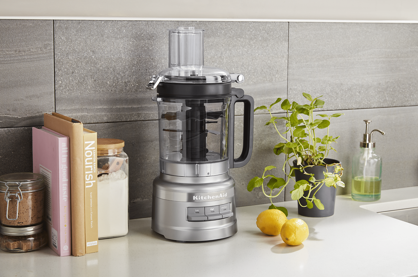KitchenAid® food processor on a modern kitchen counter. KitchenAid® food processor on a modern kitchen counter.