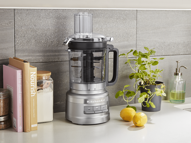 KitchenAid® food processor on a modern kitchen counter. KitchenAid® food processor on a modern kitchen counter.