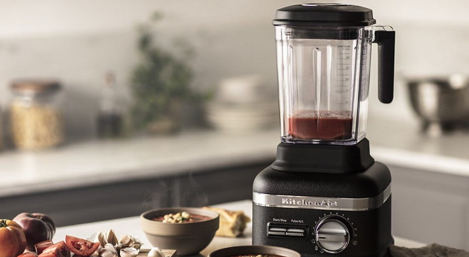 KitchenAid® blender in matte black with tomato sauce in the jar