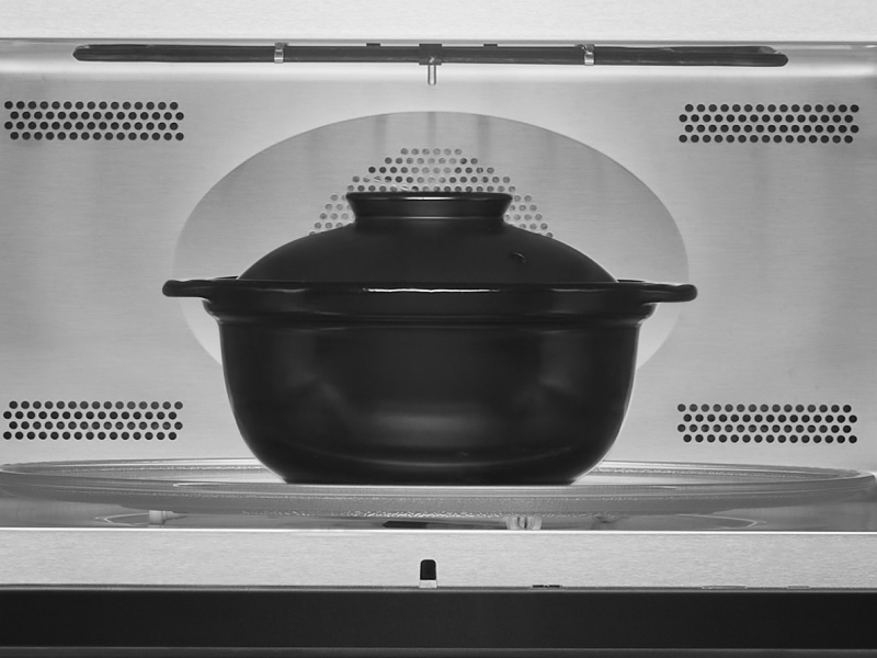 Black dutch oven in the oven