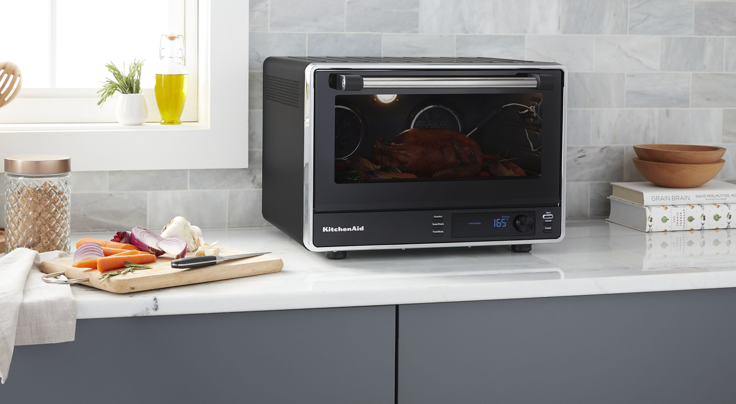 A meal cooking in a KitchenAid® Countertop Oven