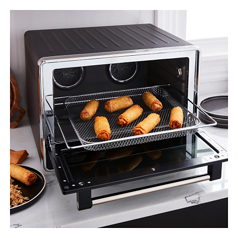 Countertop oven with air fry settings making spring rolls 