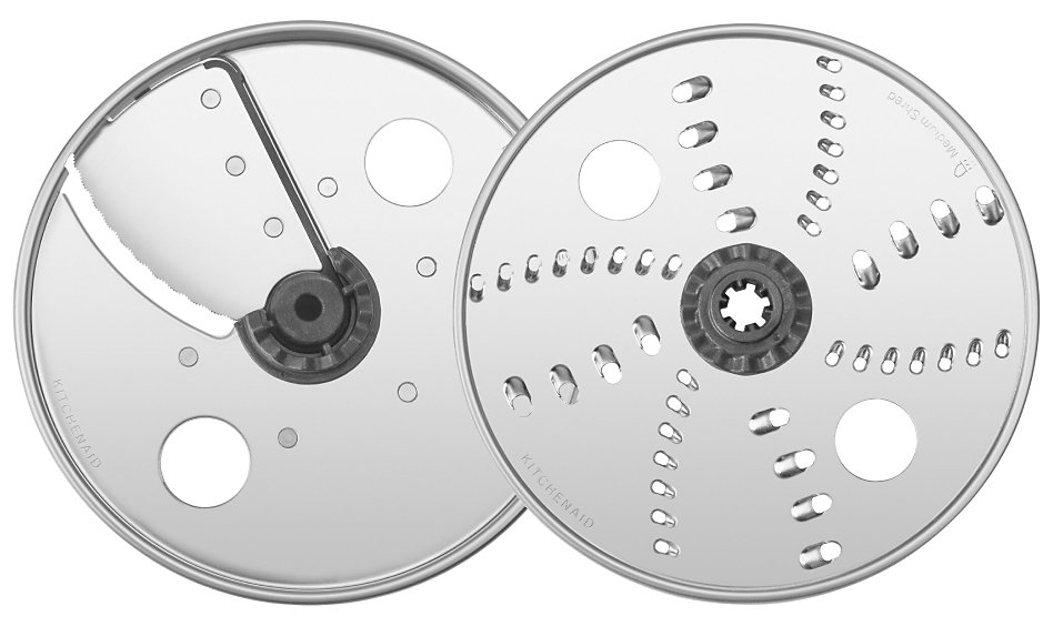 Close up image of food processor shredder disc and slicing disc Close up image of food processor shredder disc and slicing disc