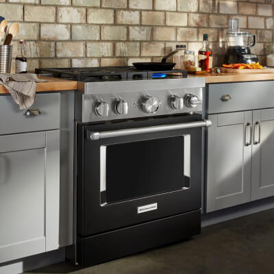 KitchenAid® range set in gray cabinetry