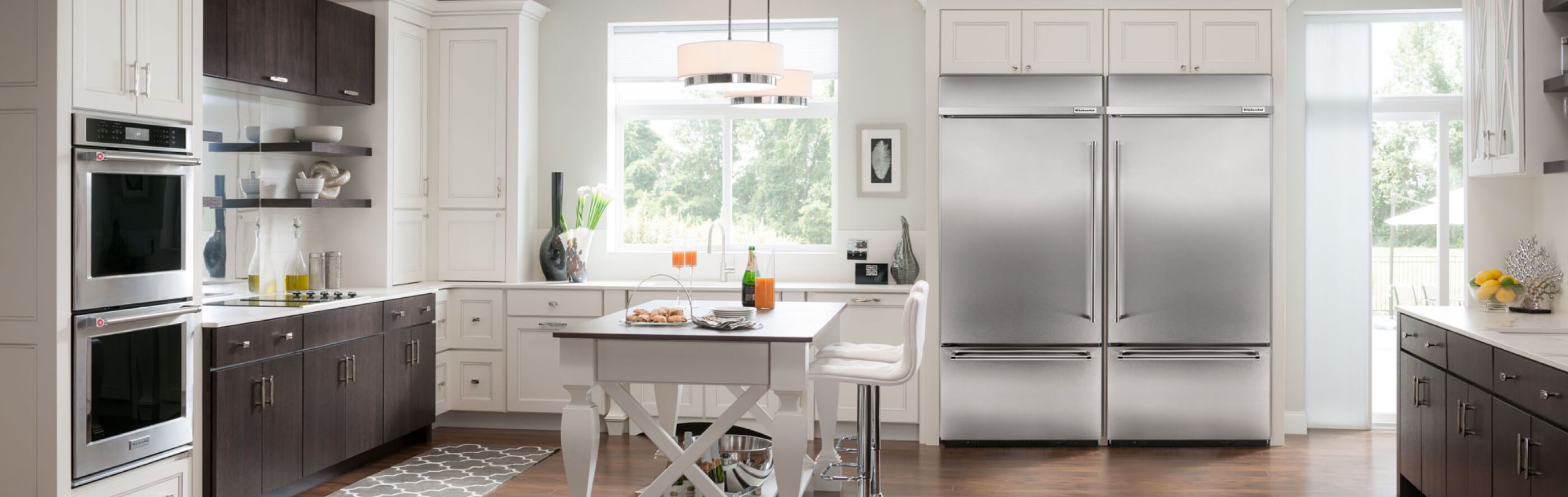 A kitchen featuring a KitchenAid® large capacity refrigerator