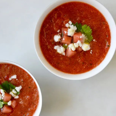 Bowl of watermelon gazpacho topped with feta cheese