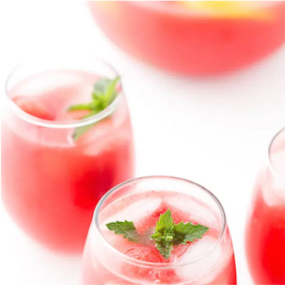 Watermelon cocktails garnished with fresh mint