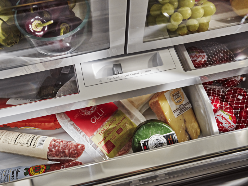 Various meats and cheeses in a FreshChill™ Temperature-Controlled drawer.